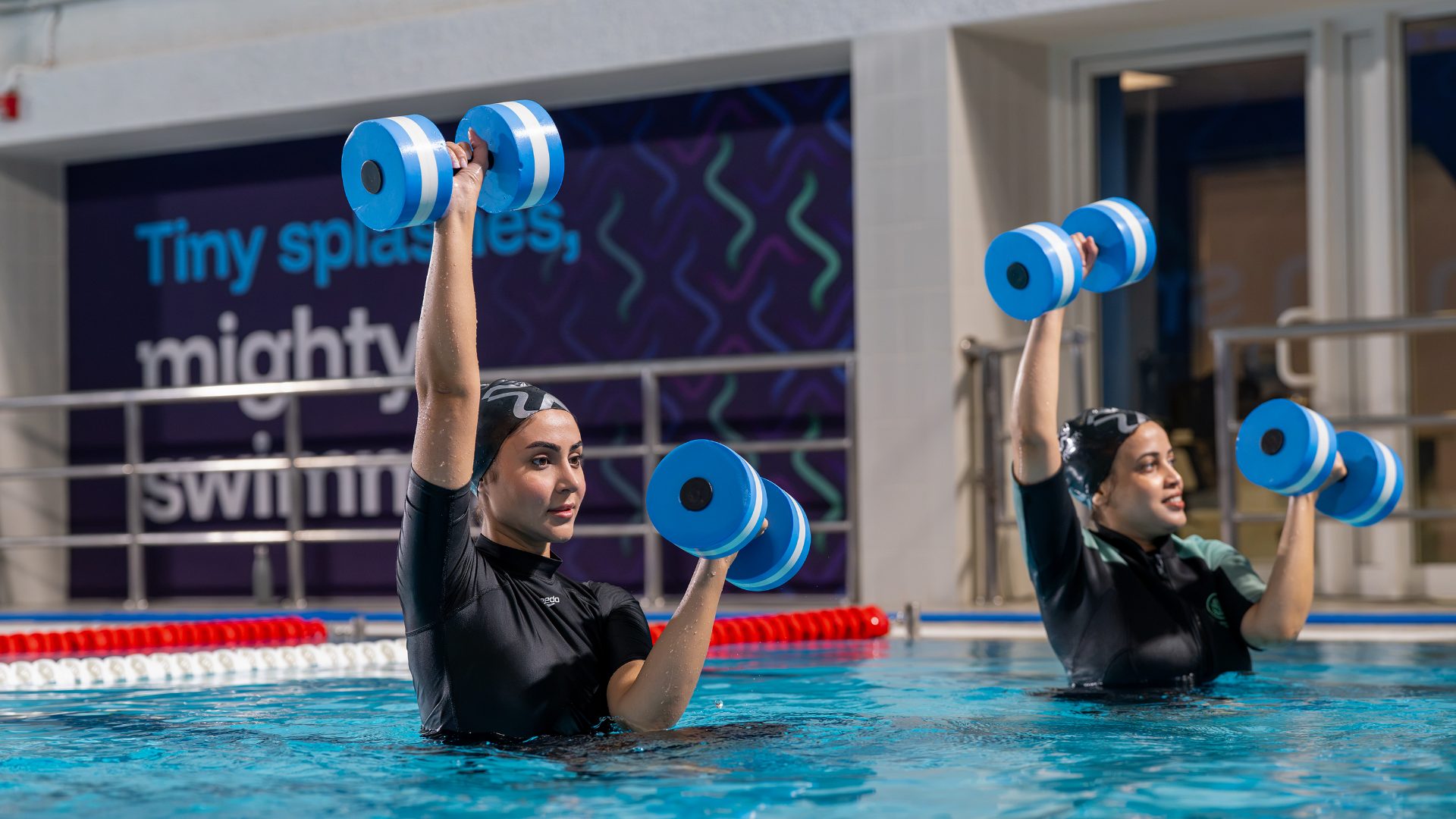 An aqua aerobics class in session