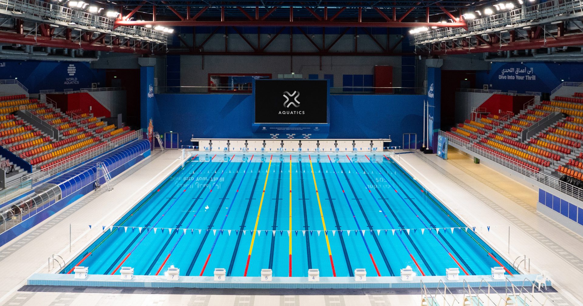 The main competition pool and Vortex Aquatics screen inside Hamad Aquatic Center